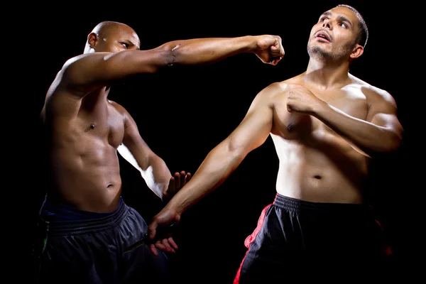 Fight instructor demonstrating self defense — Stock Photo, Image