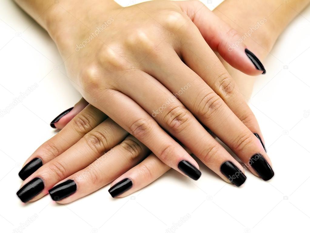 female hands showing nail polish