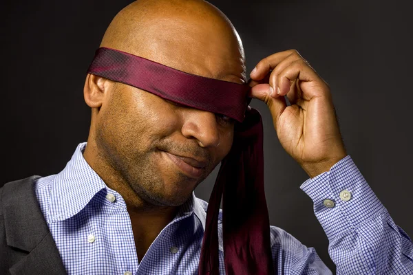 Black businessman blindfolded — Stock Photo, Image