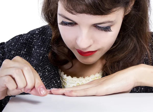 Woman pick something up from surface — Stock Photo, Image