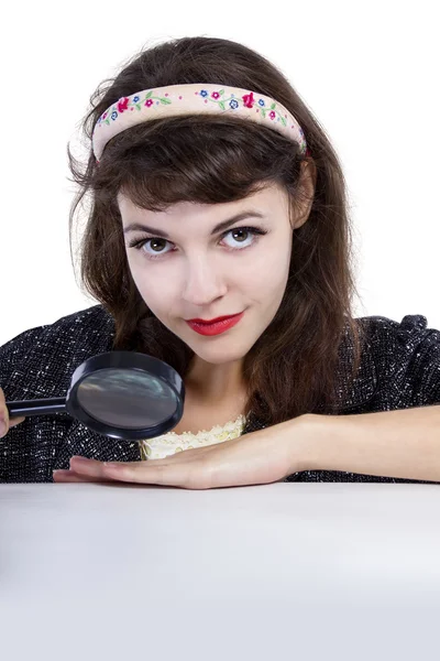 Mujer mirando con lupa —  Fotos de Stock