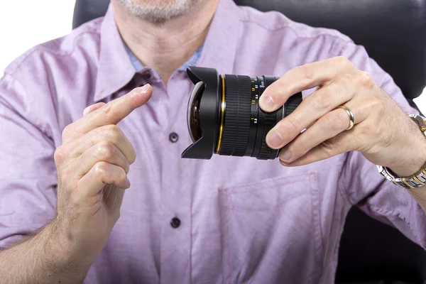 Professional photographer showing camera gear — Stock Photo, Image
