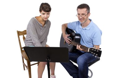 teacher tutoring female play guitar clipart