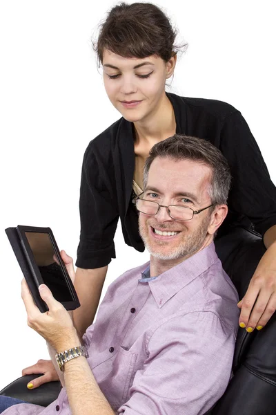 Female giving father tablet — Stock Photo, Image