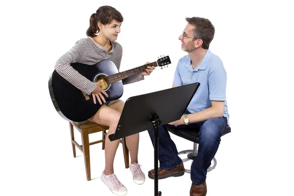 Teacher tutoring female play guitar — Stock Photo, Image