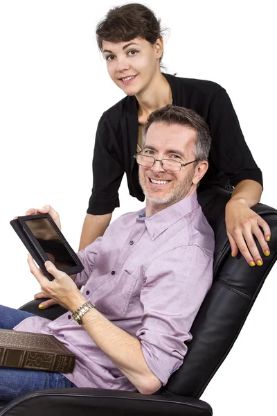 Female giving father tablet — Stock Photo, Image