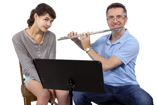 Instruktor muzyki grać flet — Zdjęcie stockowe