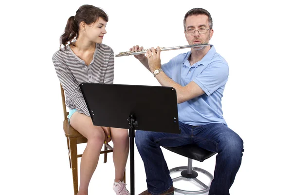 Instruktor muzyki grać flet — Zdjęcie stockowe