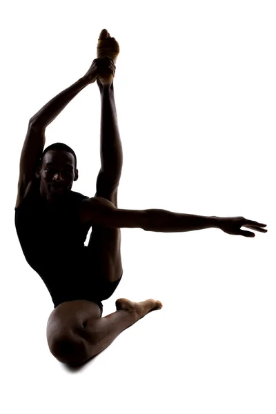 Elastyczne tancerz mężczyzna pozowanie i równoważenia — Zdjęcie stockowe