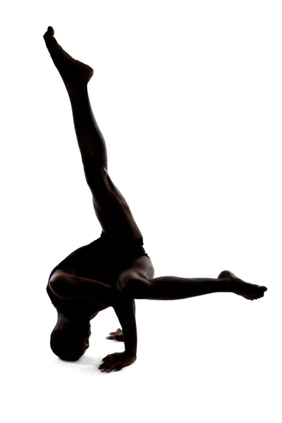 Flexible male dancer posing and balancing — Stock Photo, Image