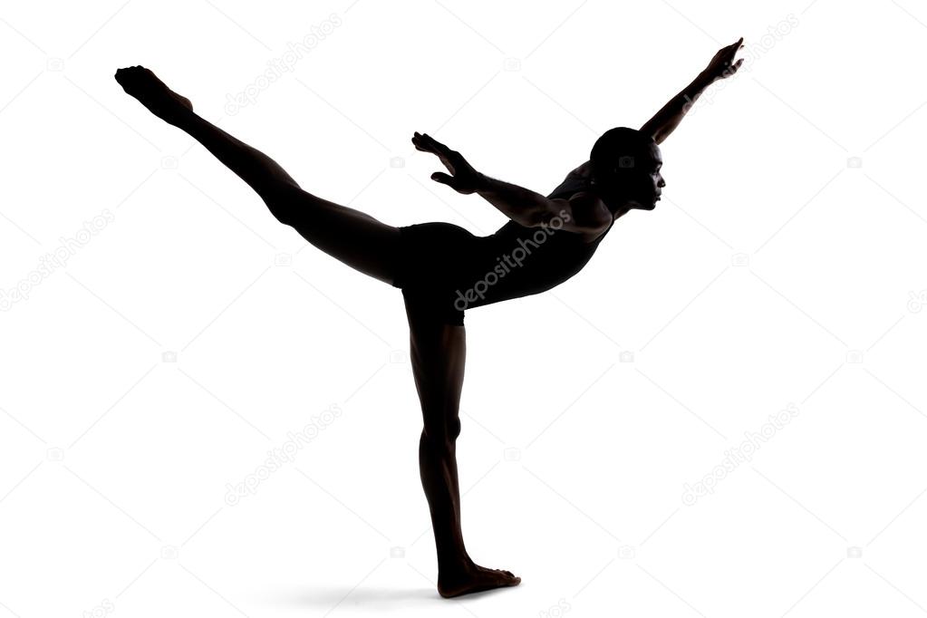 flexible male dancer posing and balancing
