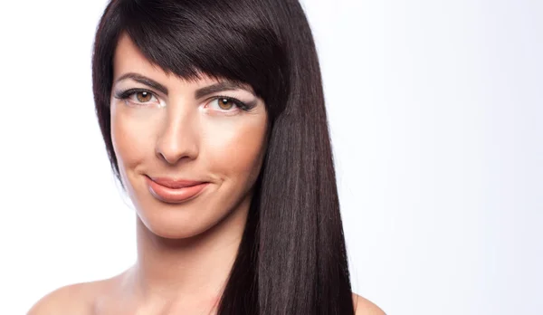 Young and beautiful woman holding hair — Stock Photo, Image