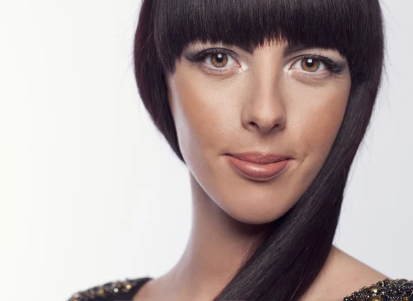 Young and beautiful woman holding hair — Stock Photo, Image