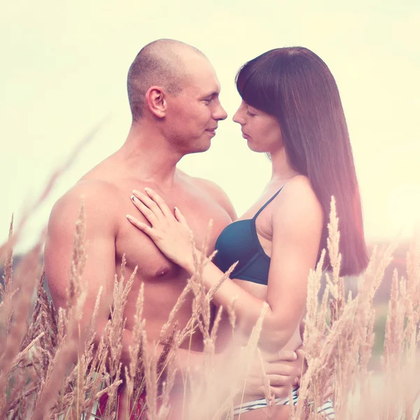 Young and beautiful couple in love outdoors — Stock Photo, Image