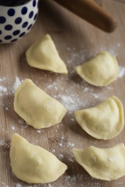 Raw dumplings - polish pierogi — Stock Photo, Image