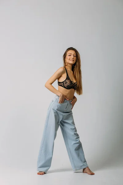 Young Beautiful Girl Good Body Shapes Firebox Jeans Studio White — Stock Photo, Image