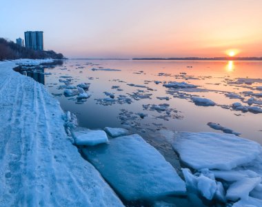 Very beautiful ice drift on the Volga river, in Samara city of Russia clipart