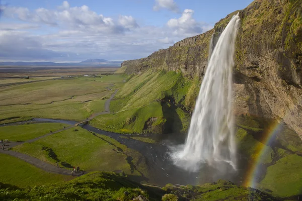 Seljalandsfoss wasserfall mit dem regenbogen — Stockfoto