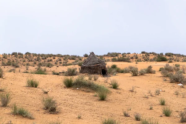 stock image an old hut built by tribal indians living in thar desert.