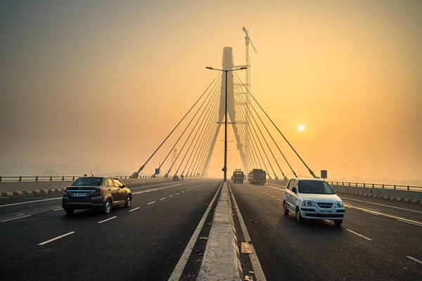 signature bridge is a cantilever spar cable stayed bridge which spans the yamuna river in delhi,with beautiful sun rise.