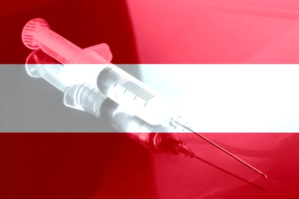 Flag of Austria, a syringe and vaccination against Corona Virus