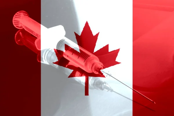 Flag of Canada, syringe and vaccination against Corona Virus