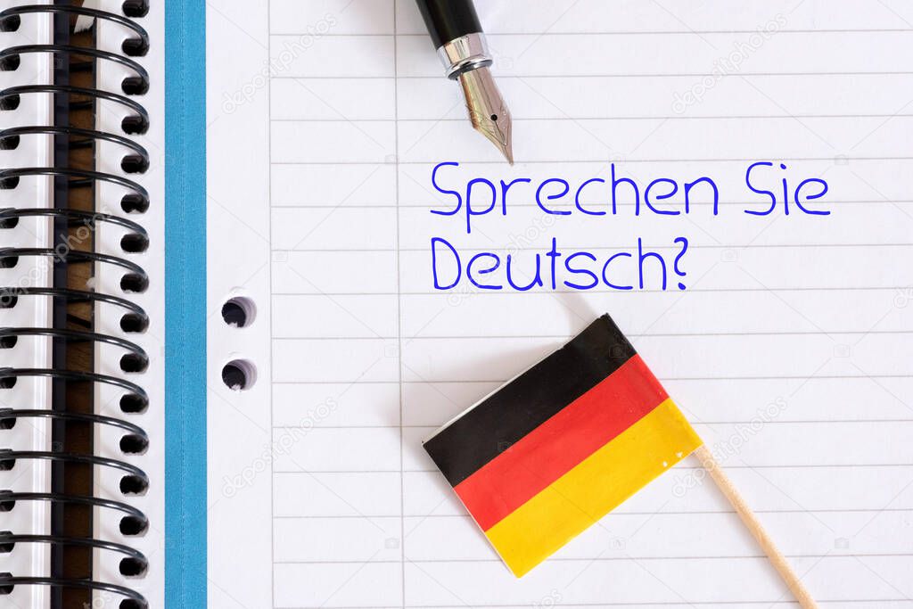 Flag of Germany, exercise book and question Do you speak German