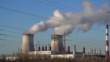 Sanayi ve elektrik üretiminin sembolü olarak bir fabrika veya elektrik santrali