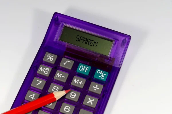 Calculadora e um lápis — Fotografia de Stock