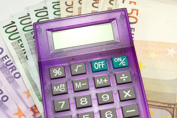 Калькулятор і гроші — стокове фото