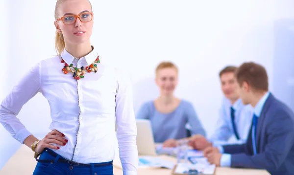 Portrait of a young woman working at office standing — Stock Photo, Image