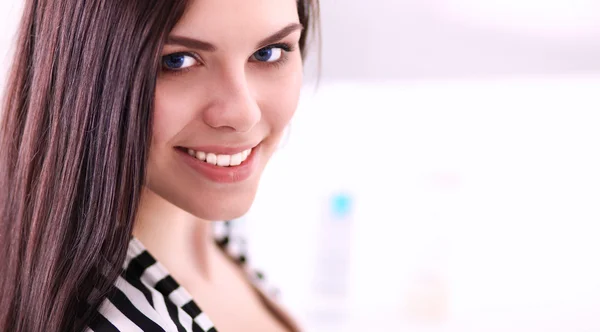 Beautiful young woman in shop — Stock Photo, Image