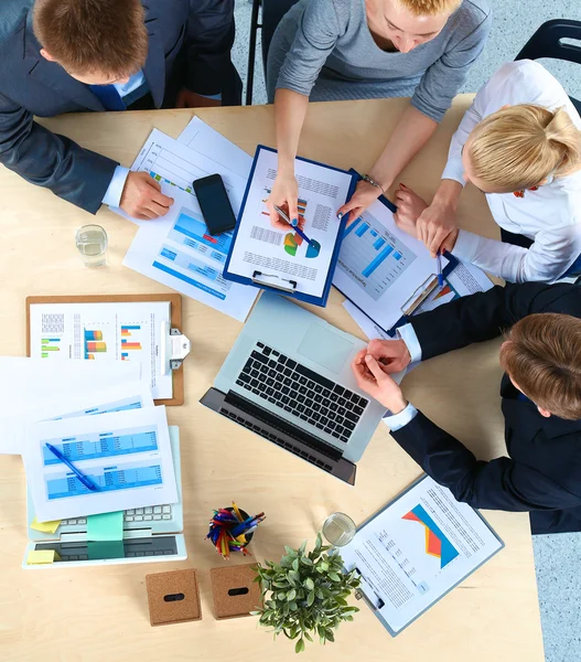 Business people sitting and discussing at business meeting, in office — Stock Photo, Image