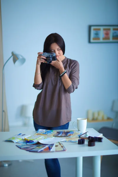 Portrait of beautiful photographer in studio — Stock Photo, Image