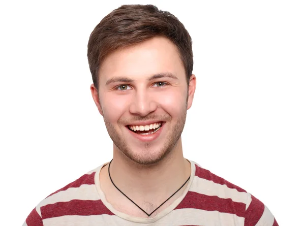 Porträt eines jungen Mannes, der isoliert auf grauem Hintergrund lächelt — Stockfoto