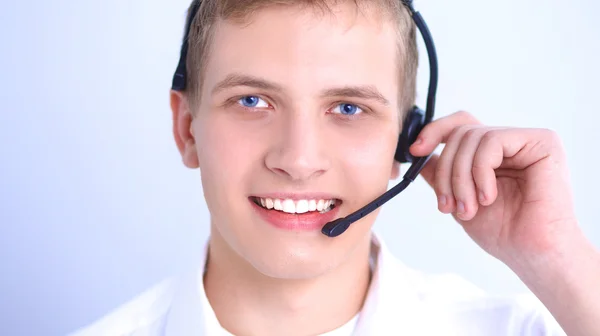 Operatore di assistenza clienti con auricolare su sfondo bianco — Foto Stock