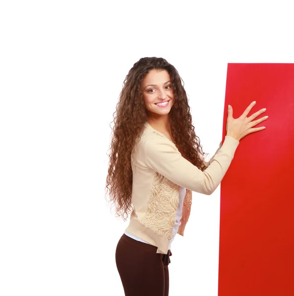 Portrait of a casual young woman holding blank card — Stock Photo, Image