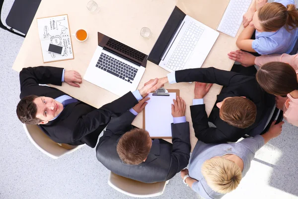 Business team with hands together - teamwork concepts Stock Photo