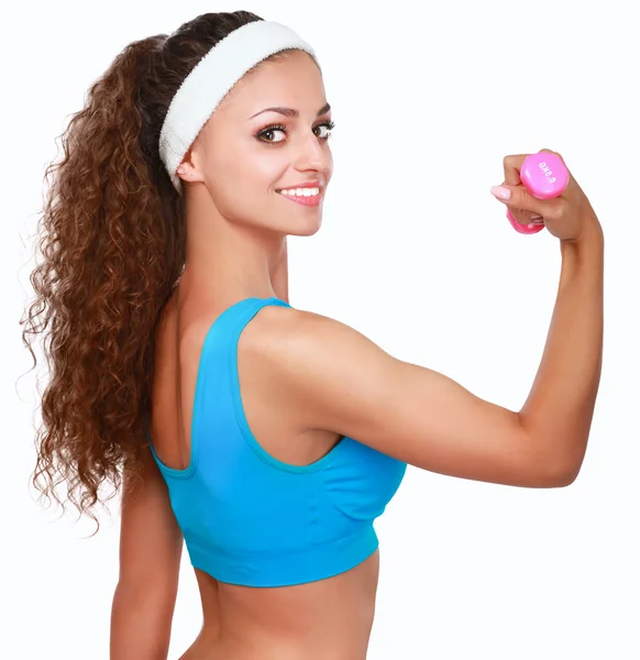 Mujer de fitness haciendo ejercicio con mancuerna — Foto de Stock