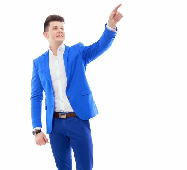 Retrato de um jovem empresário bem sucedido em pé isolado sobre fundo cinzento — Fotografia de Stock