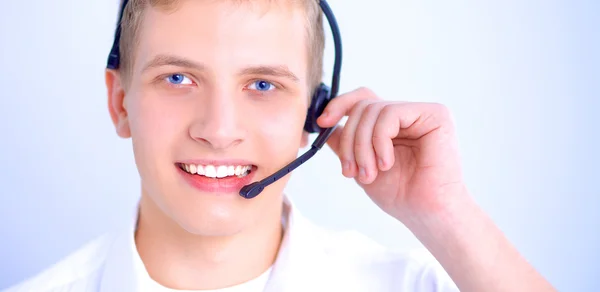 Klantenondersteuning operator met een headset op witte achtergrond — Stockfoto