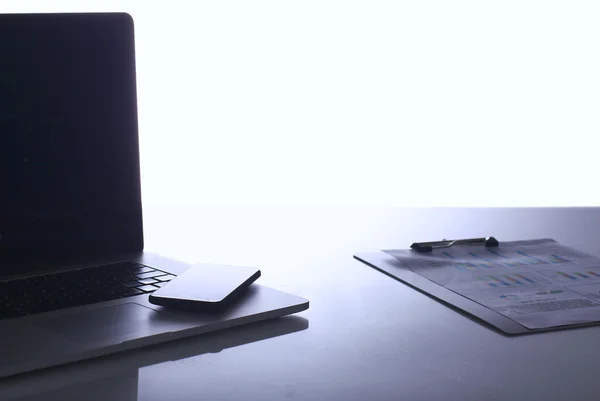 Modern home office with computer and laptop, folder, phone lying on the desk — Stock Photo, Image