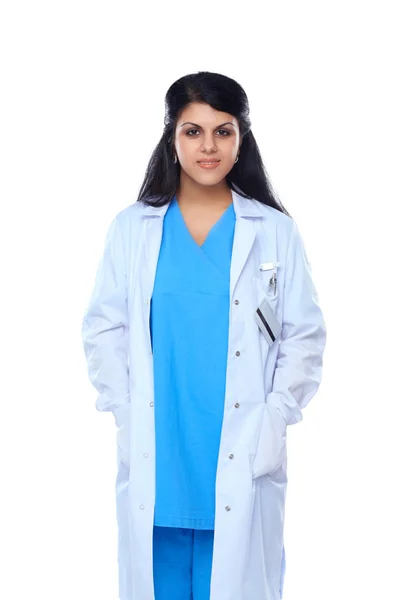 Doctor woman with stethoscope standing near wall Royalty Free Stock Images