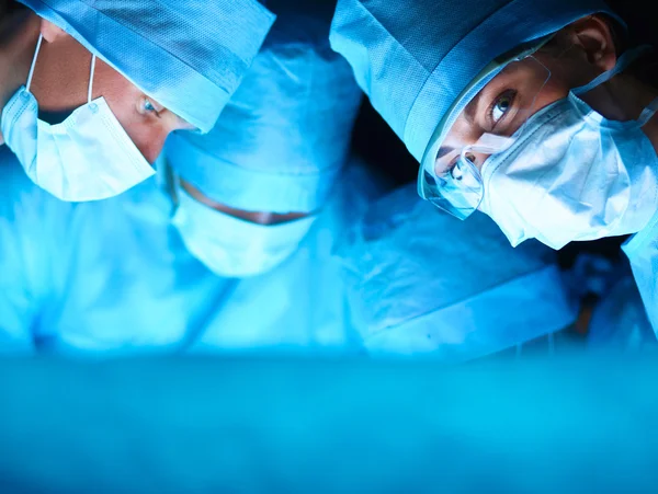 Young surgery team in the operating room — Stock Photo, Image