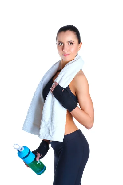 Jonge mooie sport vrouw permanent met een handdoek geïsoleerd op witte achtergrond — Stockfoto