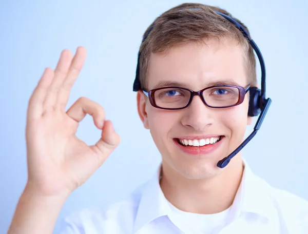 Customer support operator with a headset on white background — Stock Photo, Image