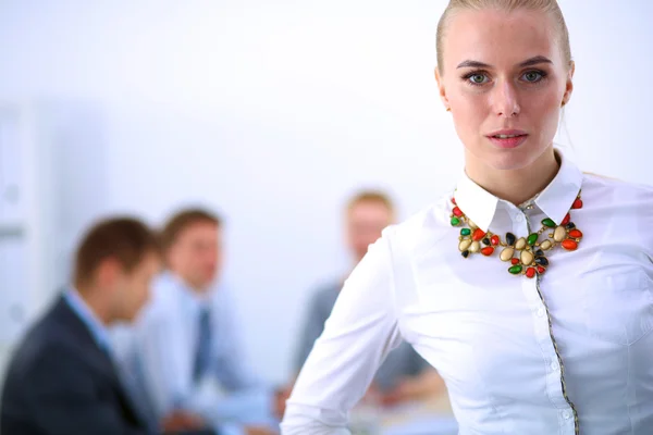 Portrait of a young woman working at office standing — Stock Photo, Image