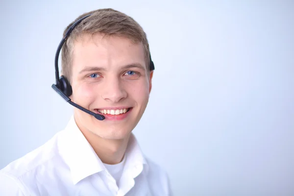 Customer support operator with a headset on white background — Stock Photo, Image