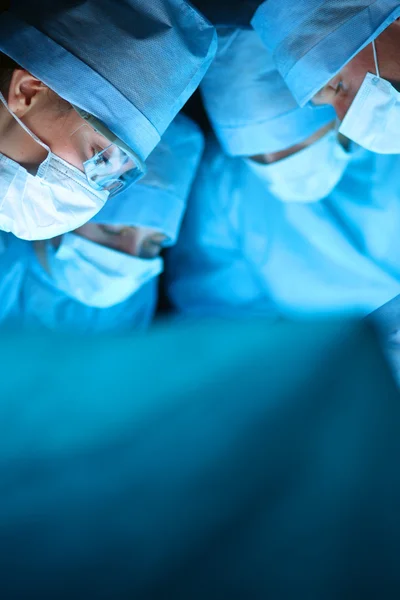 Young surgery team in the operating room — Stock Photo, Image