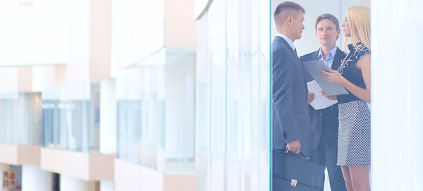 Successful business woman standing with her staff — Stock Photo, Image